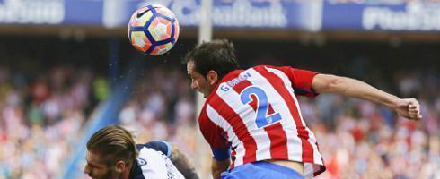 Godin-Atleti-head-epa_0_0_0_0_0