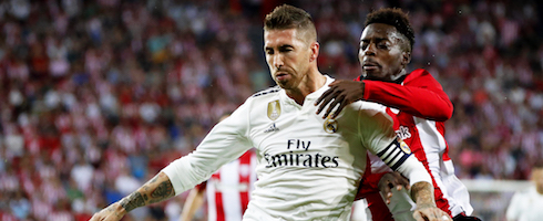 Real Madrid's Sergio Ramos fends off Inaki Williams of Athletic Bilbao