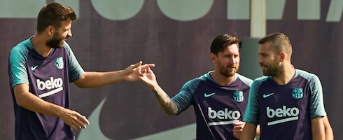 Barcelona's Gerard Pique with Lionel Messi and Jordi Alba