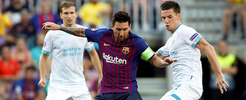 Barcelona's Lionel Messi against PSV