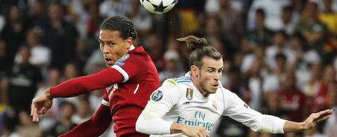 Liverpool's Virgil van Dijk vies with Gareth Bale of Real Madrid