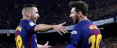 Barcelona's Jordi Alba celebrates with Lionel Messi