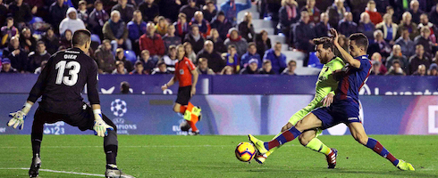 Barcelona's Lionel Messi netting against Levante