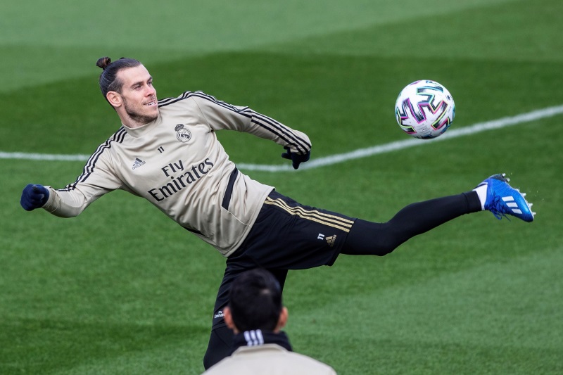 Gareth Bale clarifies Real Madrid return comments: 'Legally I have to go  back'