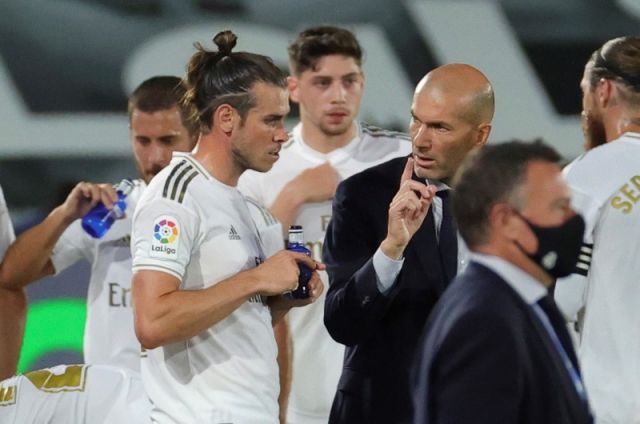 Gareth Bale with Zinedine Zidane