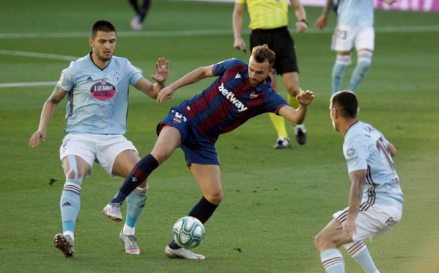 Celta Vigo's Okay Yokuslu and Levante's Borja Mayoral