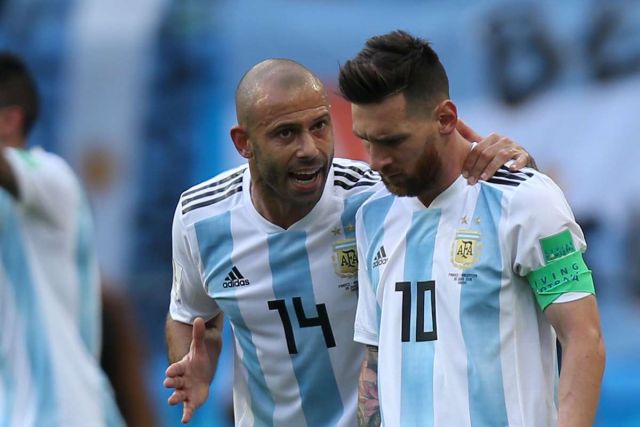 Javier Mascherano and Lionel Messi