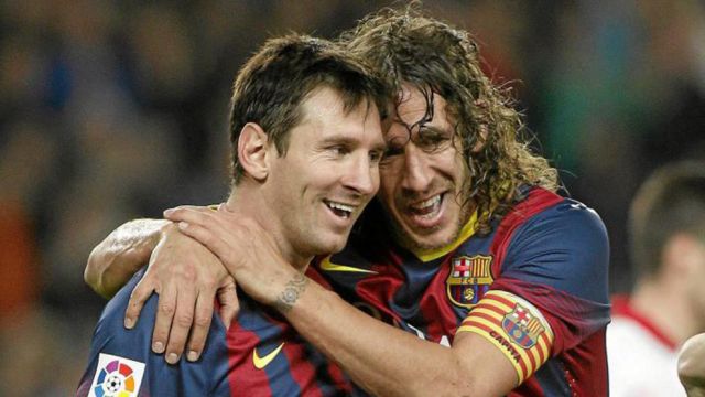 Lionel Messi and Carles Puyol at Barcelona