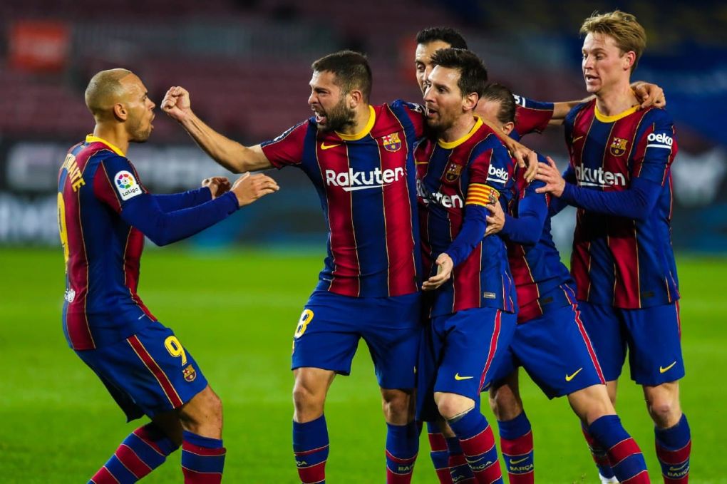 Barcelona players celebrate a goal