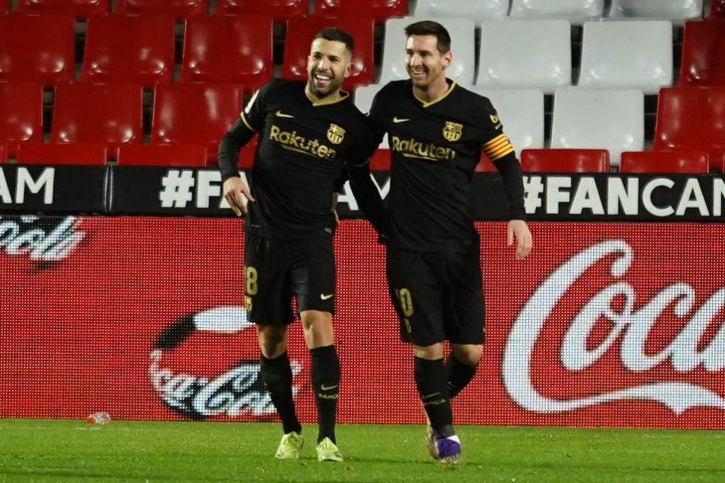 Jordi Alba and Lionel Messi
