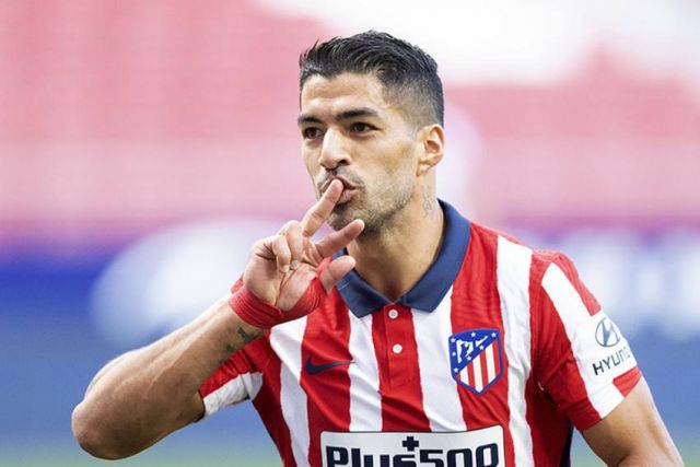 Luis Suarez double gives Atletico Madrid win over Cadiz and a 10