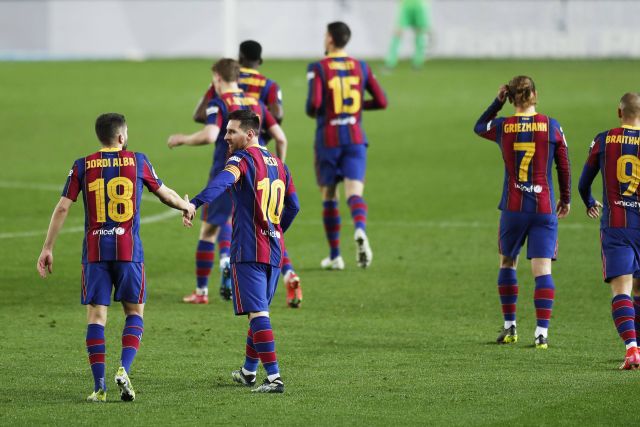 Jordi Alba and Lionel Messi