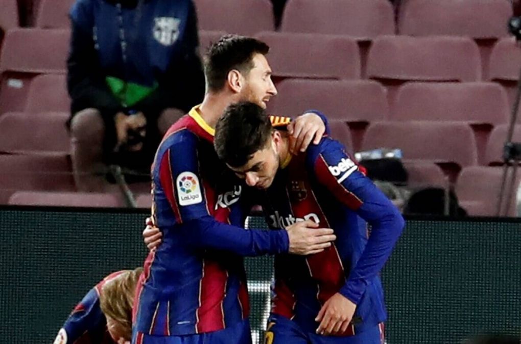 Lionel Messi and Pedri