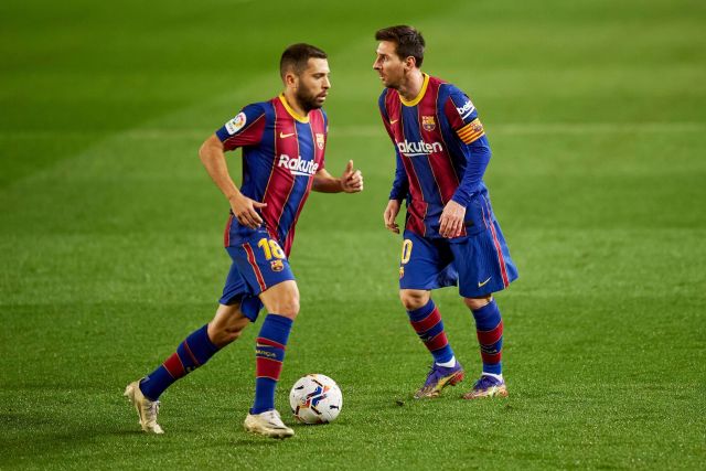 Jordi Alba and Lionel Messi