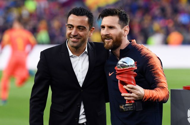 Xavi Hernandez and Lionel Messi