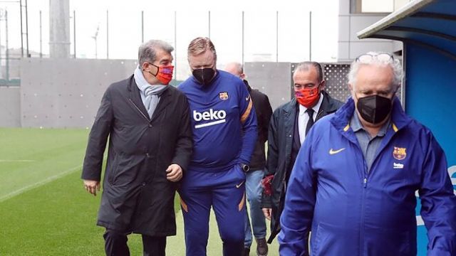 Ronald Coman y Joan Laporta