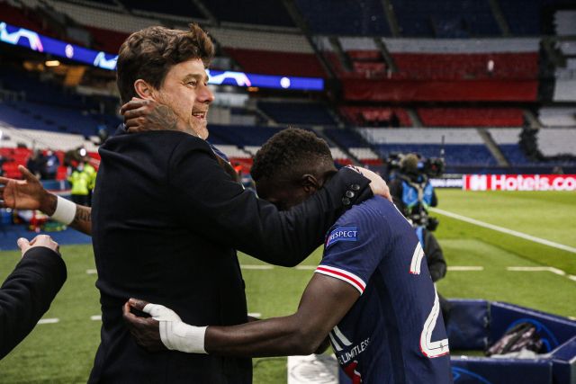 Mauricio Pochettino and Idrissa Gueye