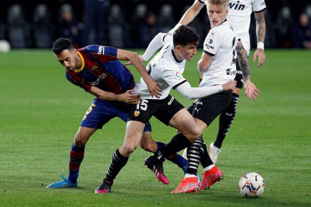 Sergio Busquets and Hugo Guillamon