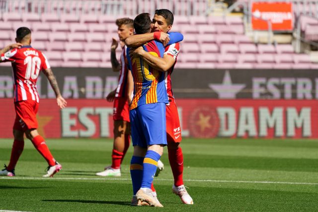 Lionel Messi and Luis Suarez