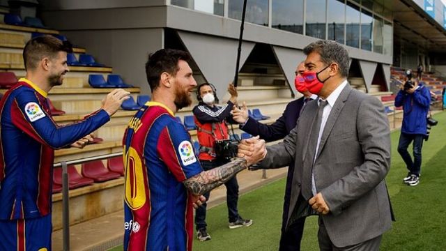 Lionel Messi and Joan Laporta