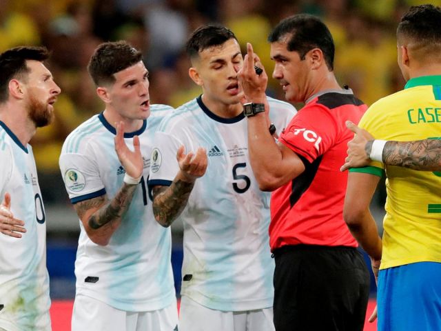 Lionel Messi and Leandro Paredes