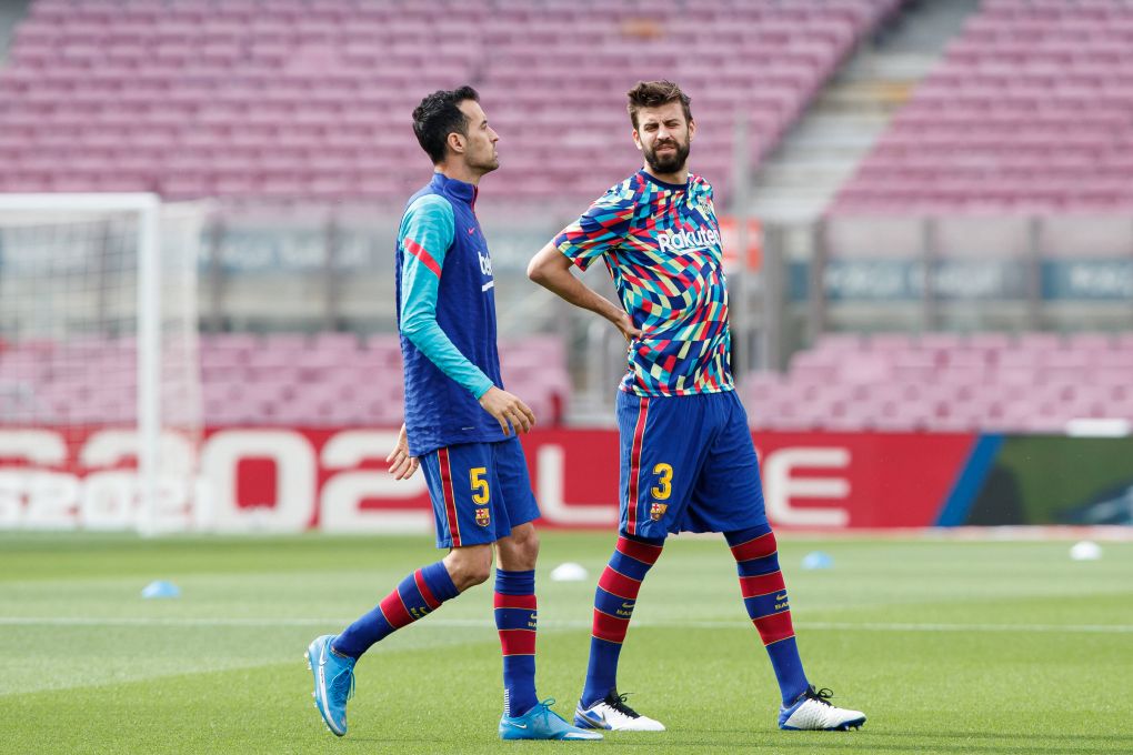 Gerard Pique and Sergio Busquets of FC Barcelona