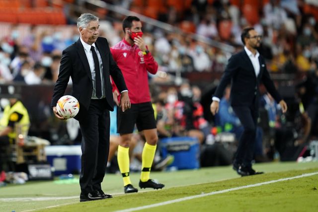 Carlo Ancelotti of Real Madrid and Jose Bordalas of Valencia