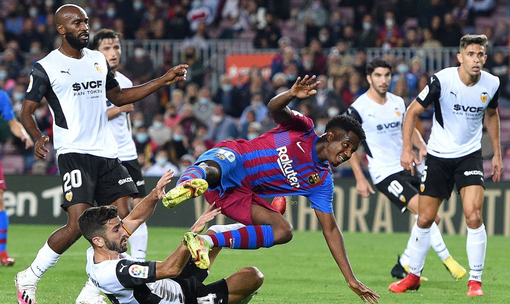 Ansu Fati of Barcelona is upended by Jose Luis Gaya