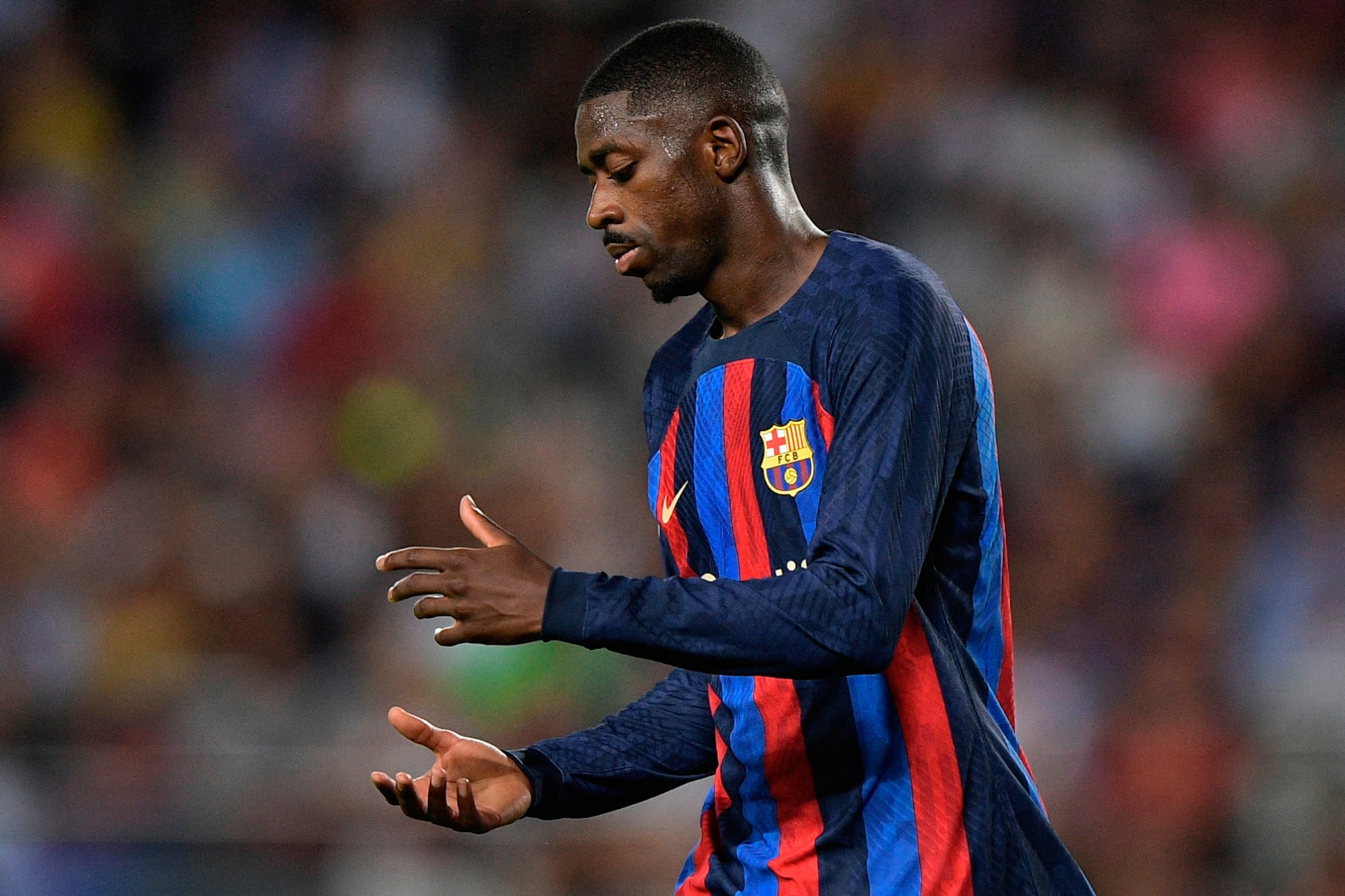 Ousmane Dembele is playing soccer for FC Barcelona, not PSG.