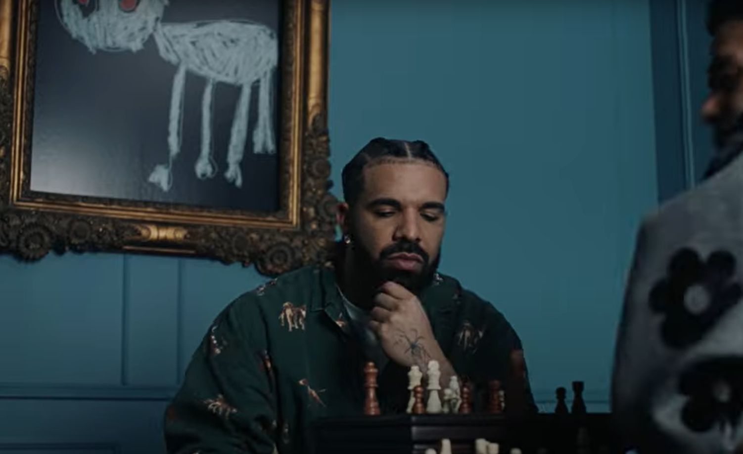 Drake & J. Cole recreated Messi & Ronaldo chess match photo for