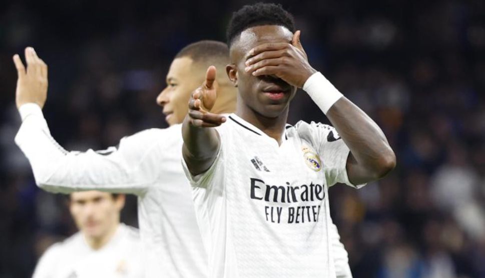 Vinicius celebrates against RB Salzburg.