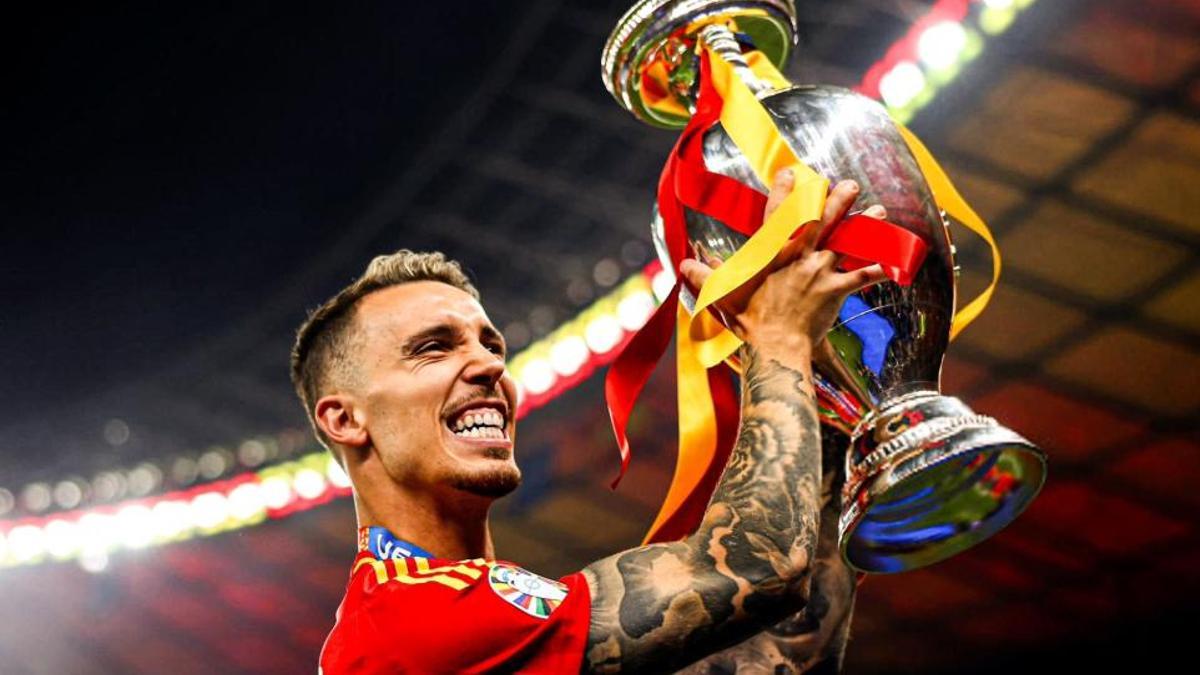 Grimaldo lifts the Euro 2024 trophy.