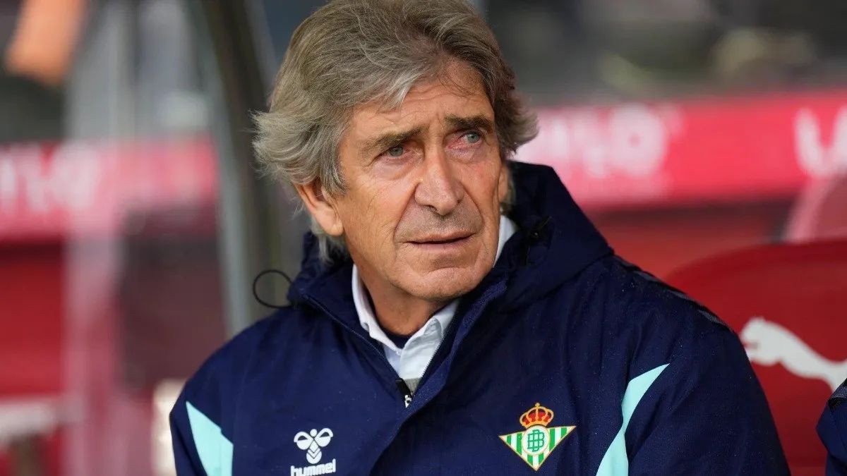 Pellegrini looks on from the bench.