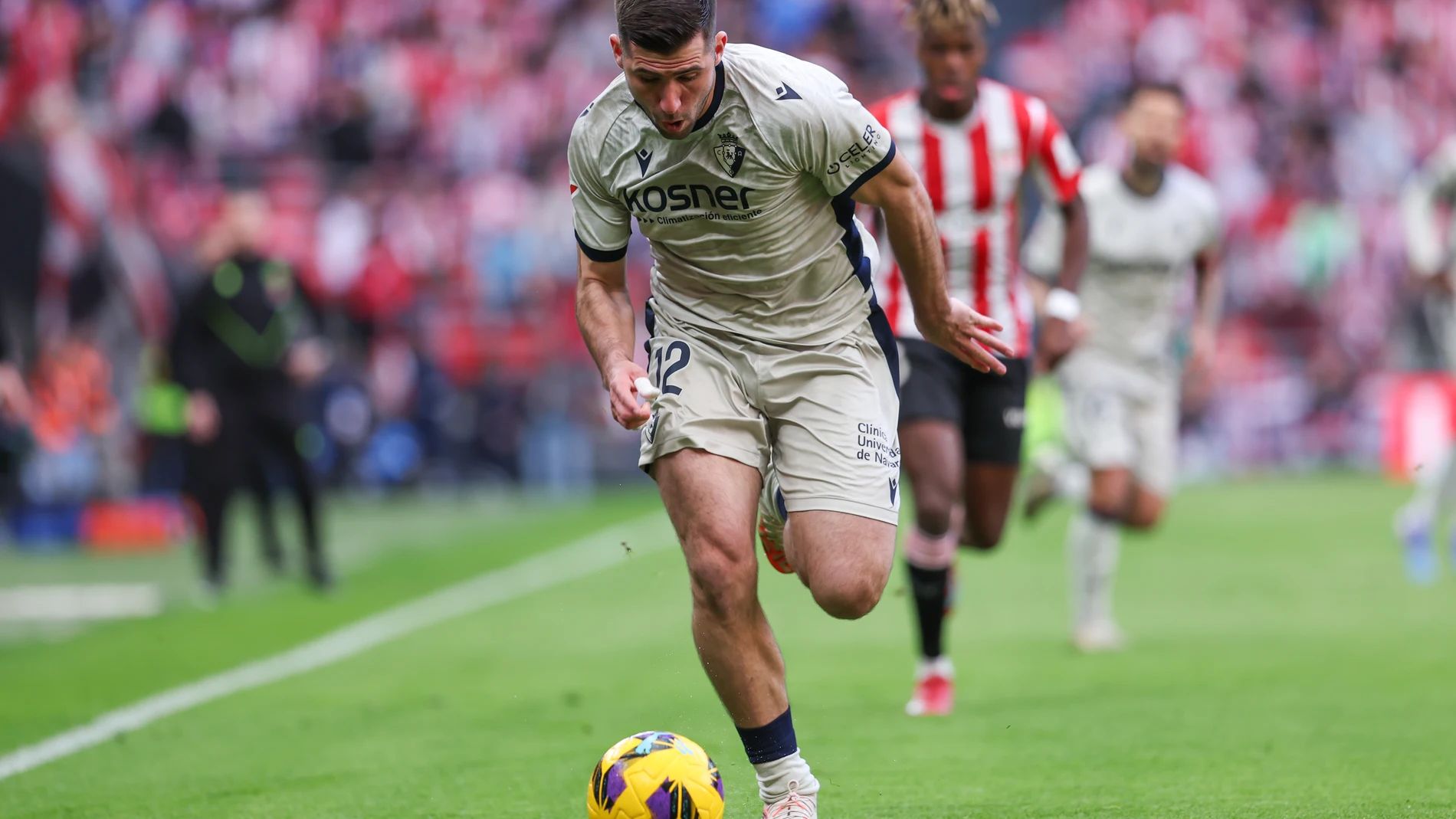Areso drives with the ball against Athletic.