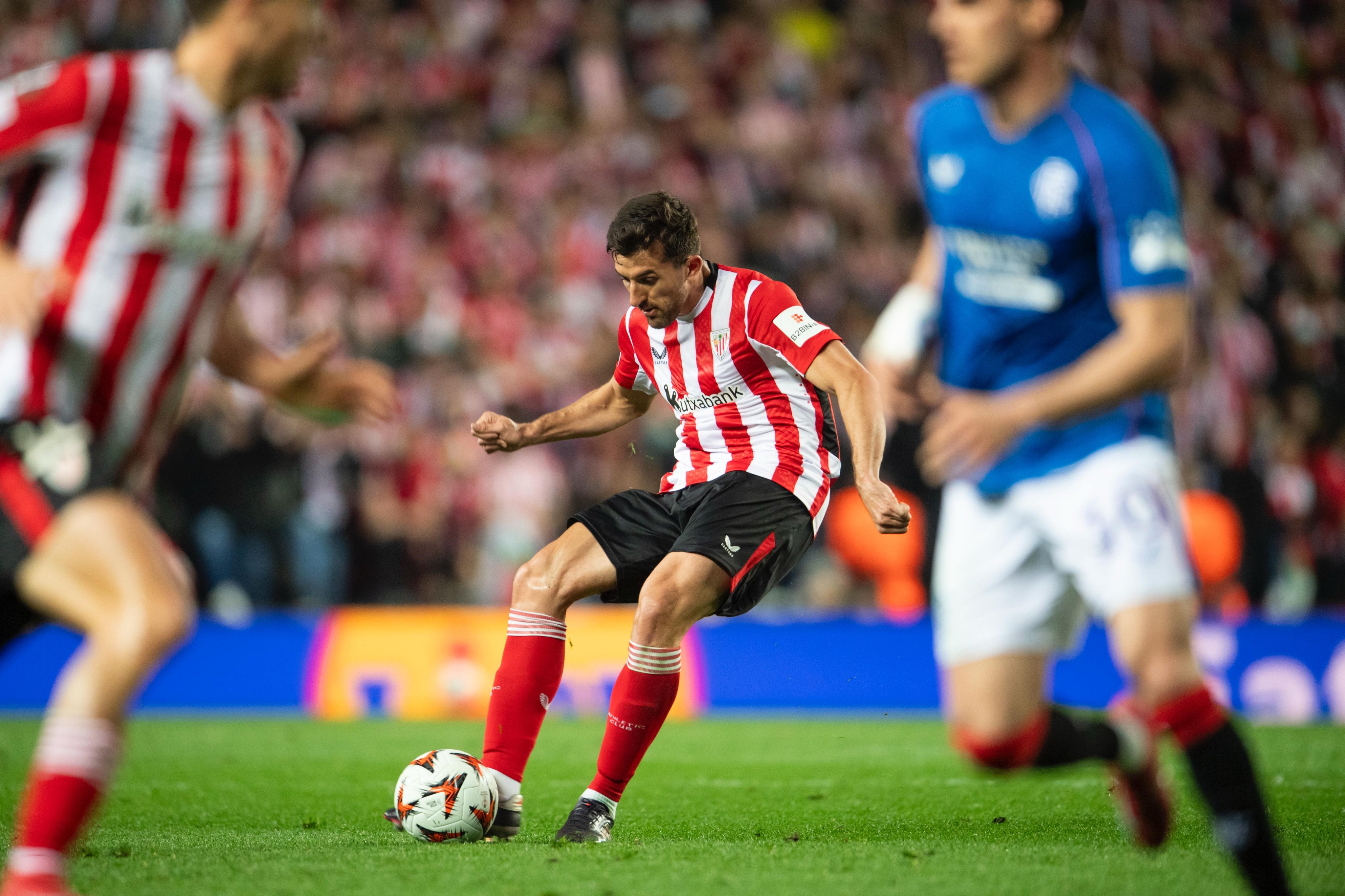 Vivian tries to filter a pass through the Rangers defence.