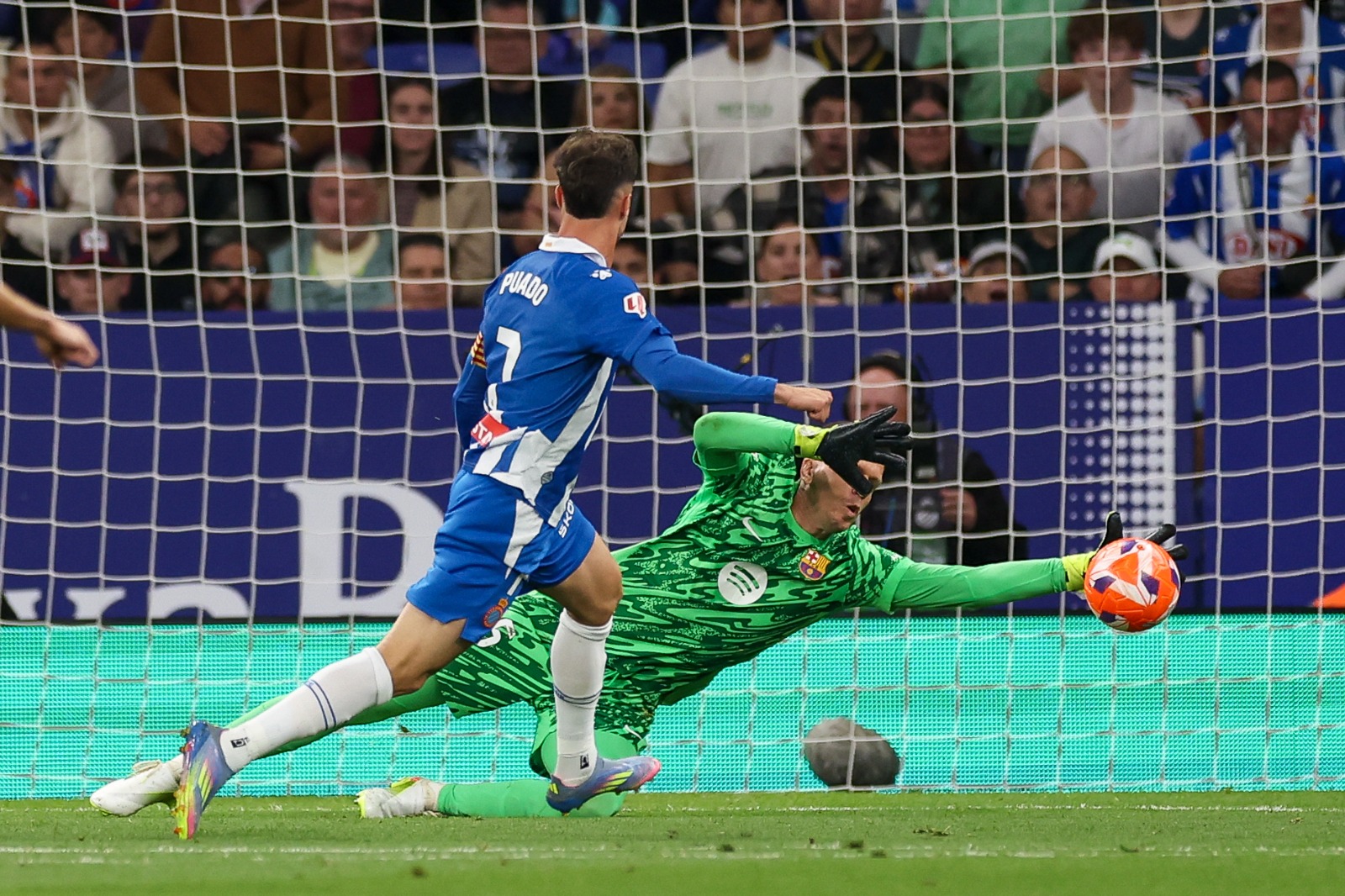 Szczesny makes a crucial save.
