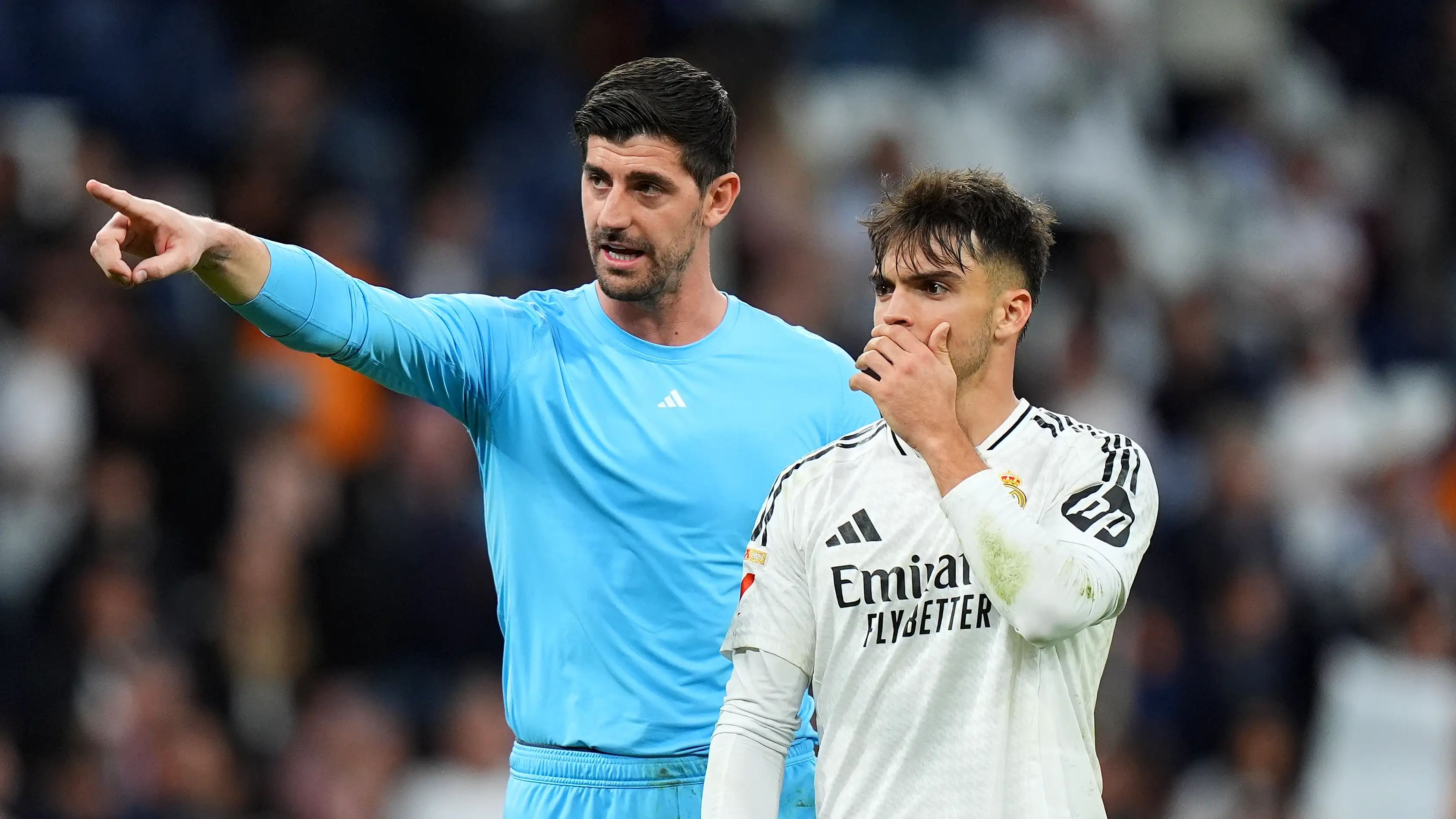 Courtois gives advice to Asencio.