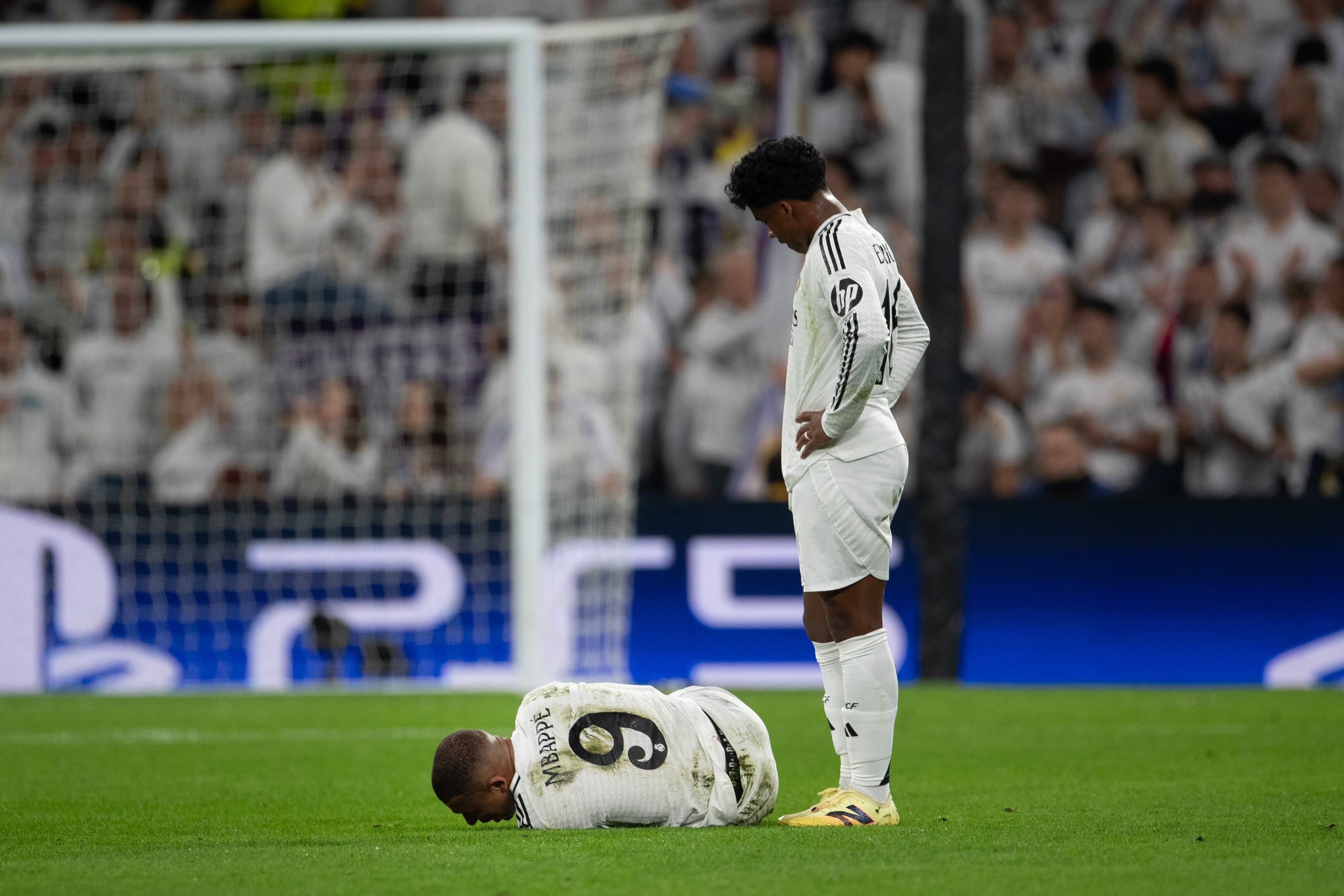 Mbappe's shirt stained by grass
