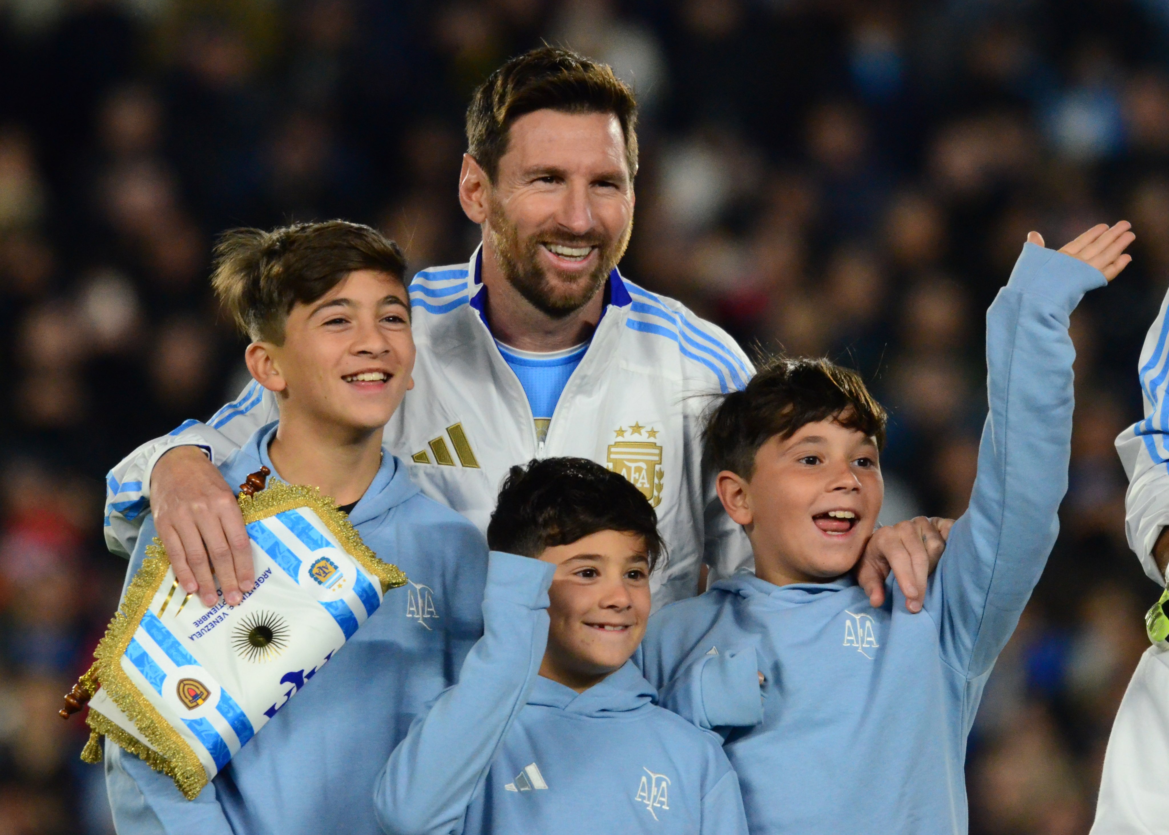 Messi with his three sons.