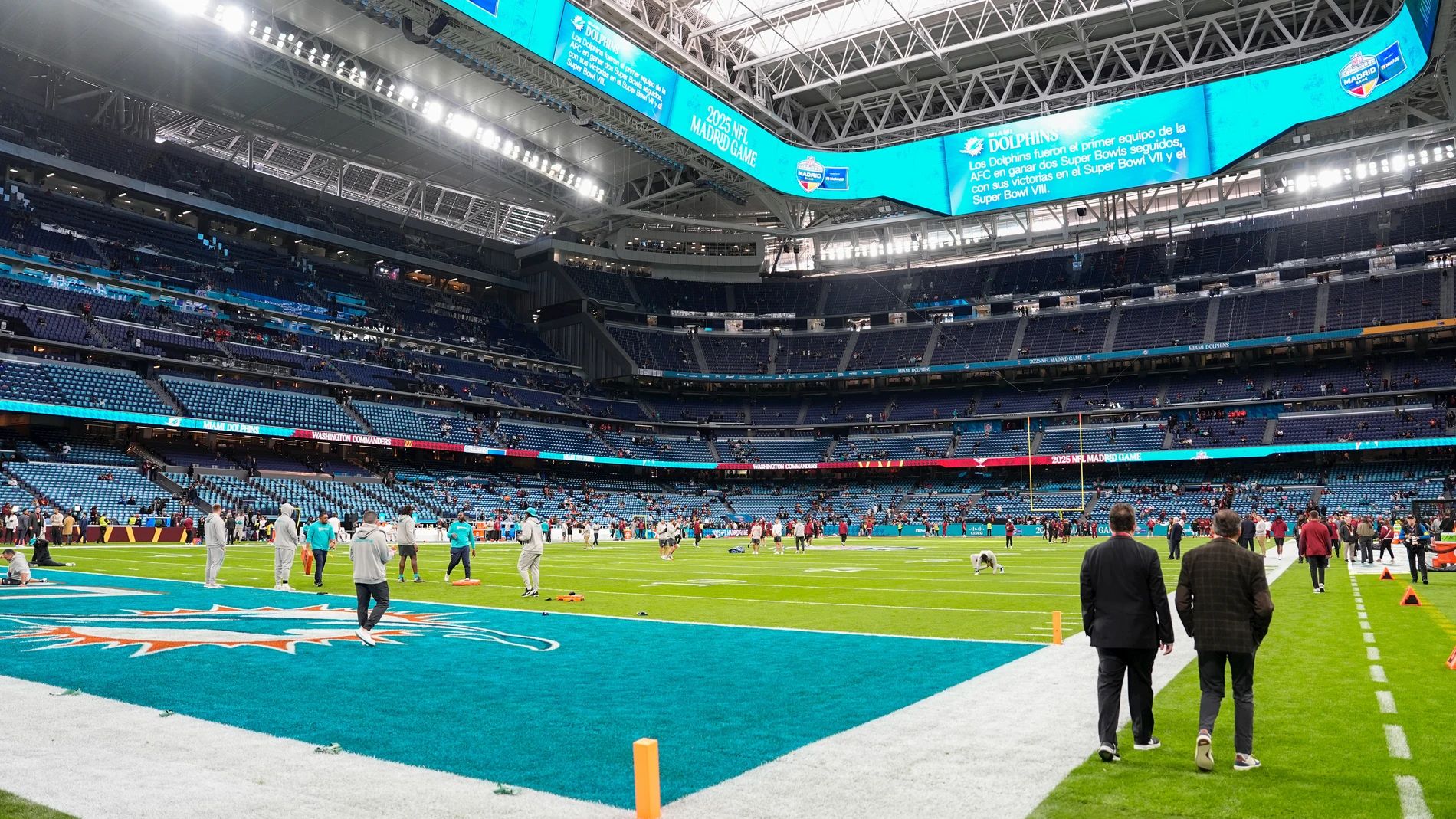Miami Dolphins warm up at the Bernabeu.