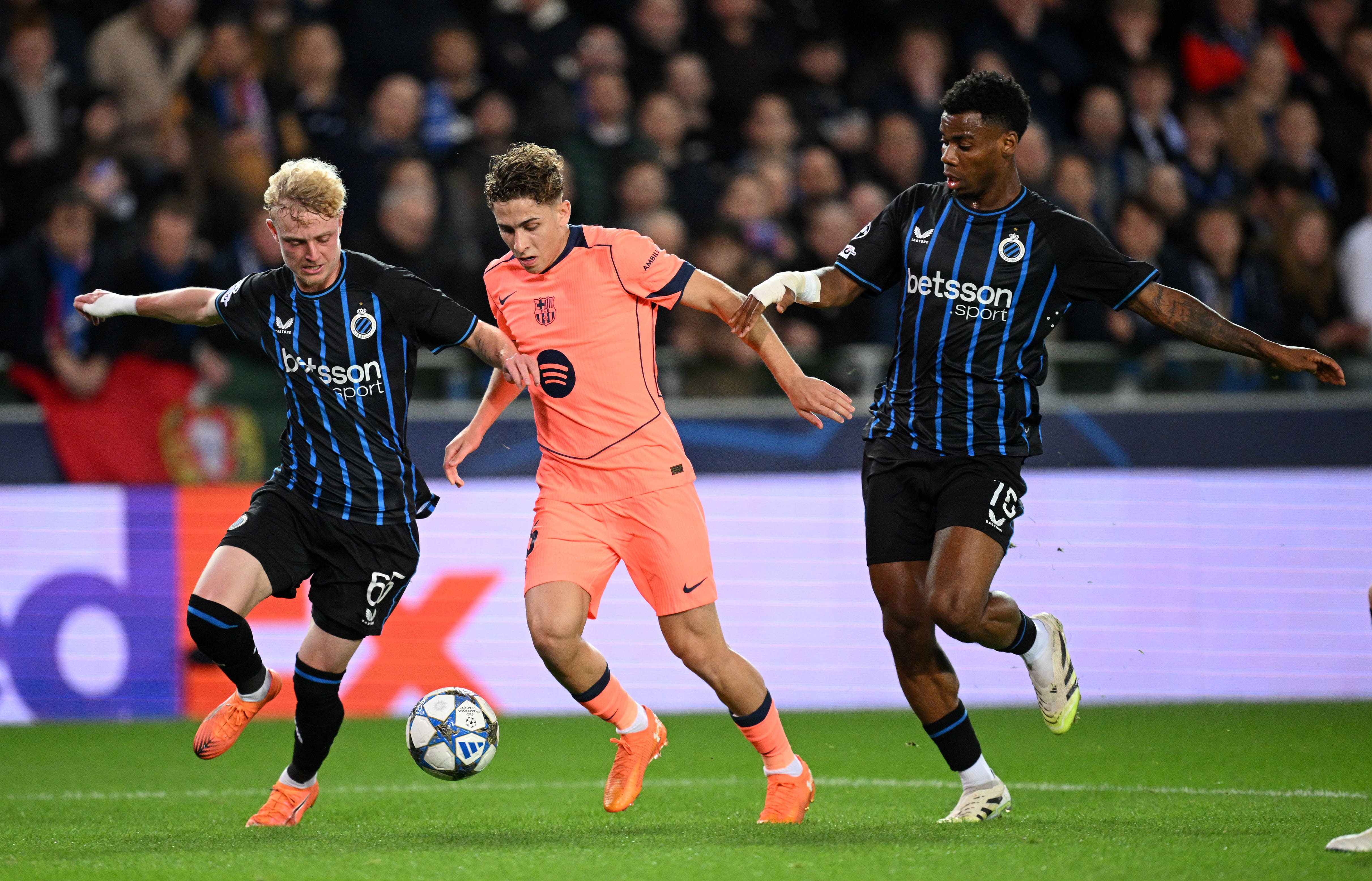 Barcelona held in six-goal Champions League thriller in Belgium