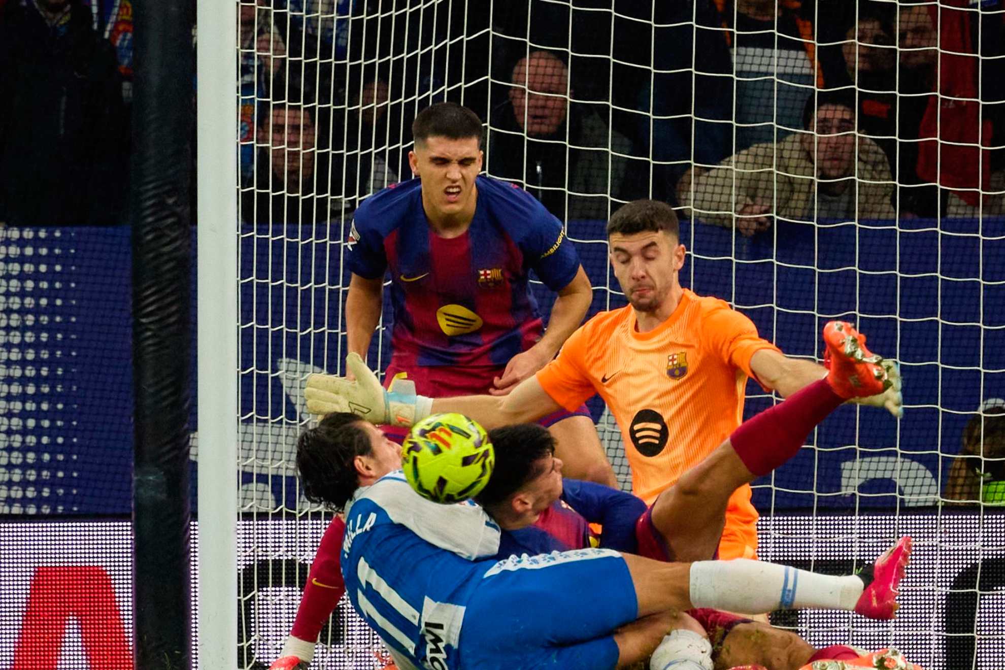 Joan Garcia makes the block with Gerard Martin's body.