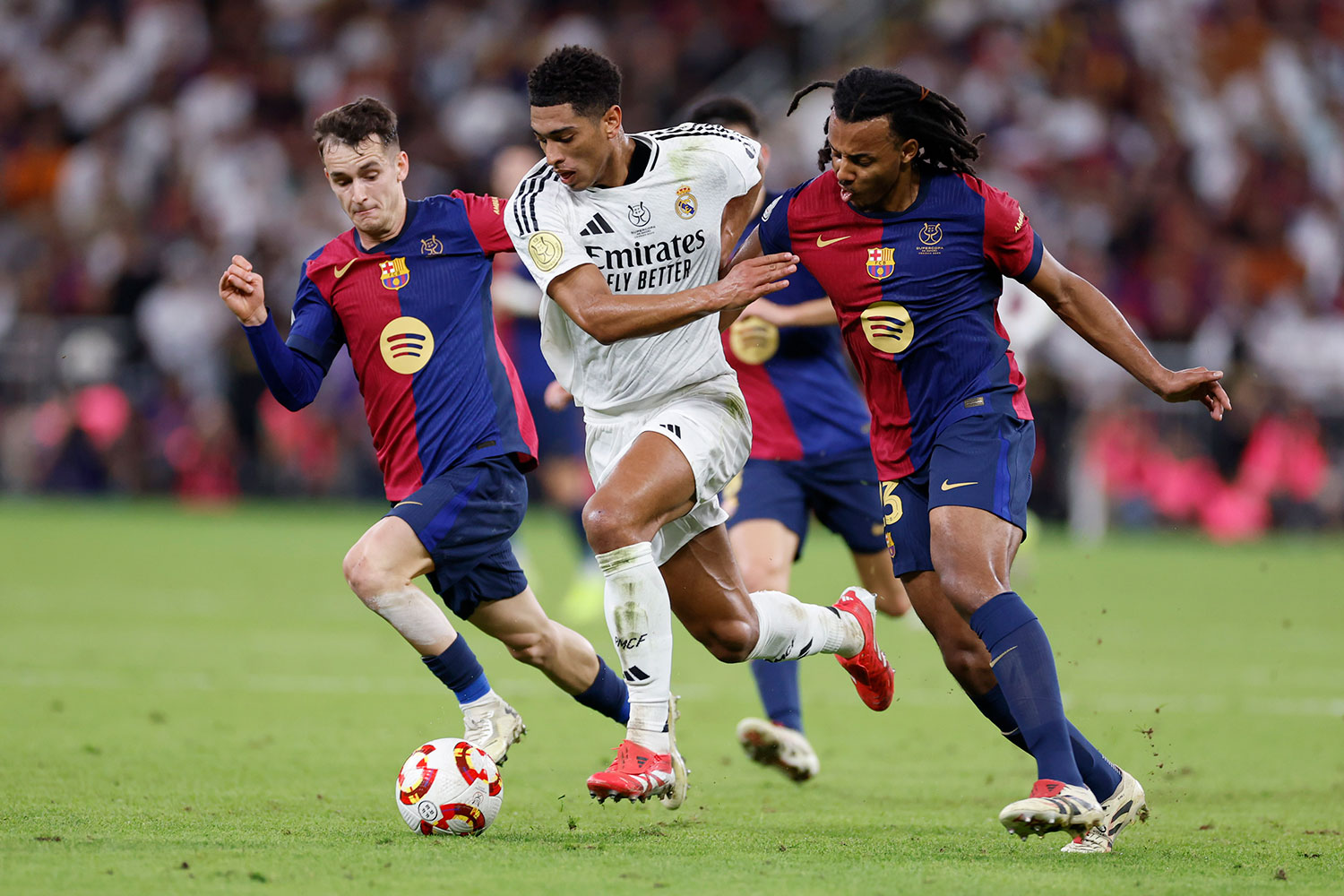 Bellingham competes with Kounde and Casado in the Supercup.