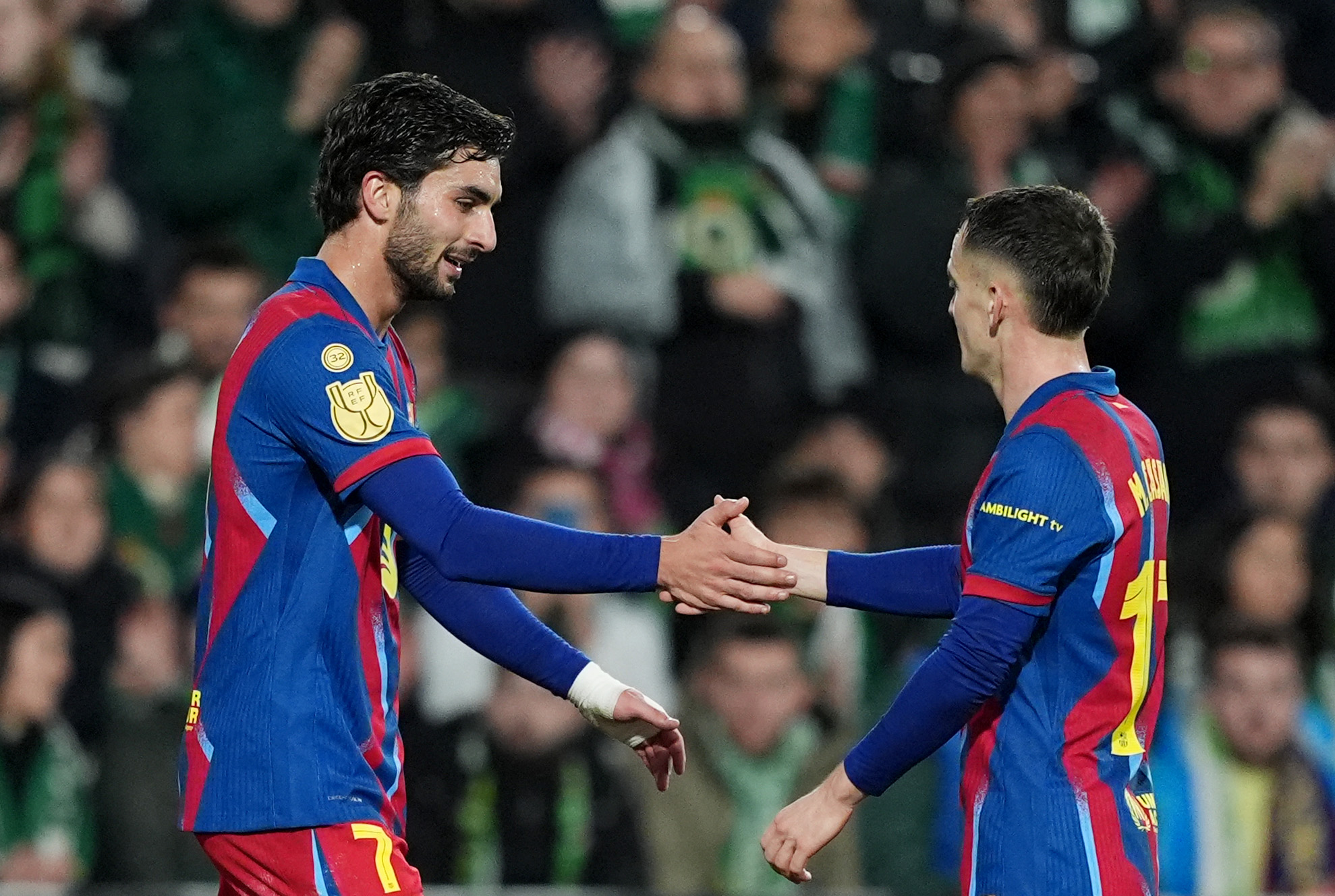 Barcelona continue Copa del Rey defence with narrow victory over Racing Santander